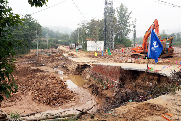 1630287031385305XfQb.jpg 洪災損毀路段2.jpg